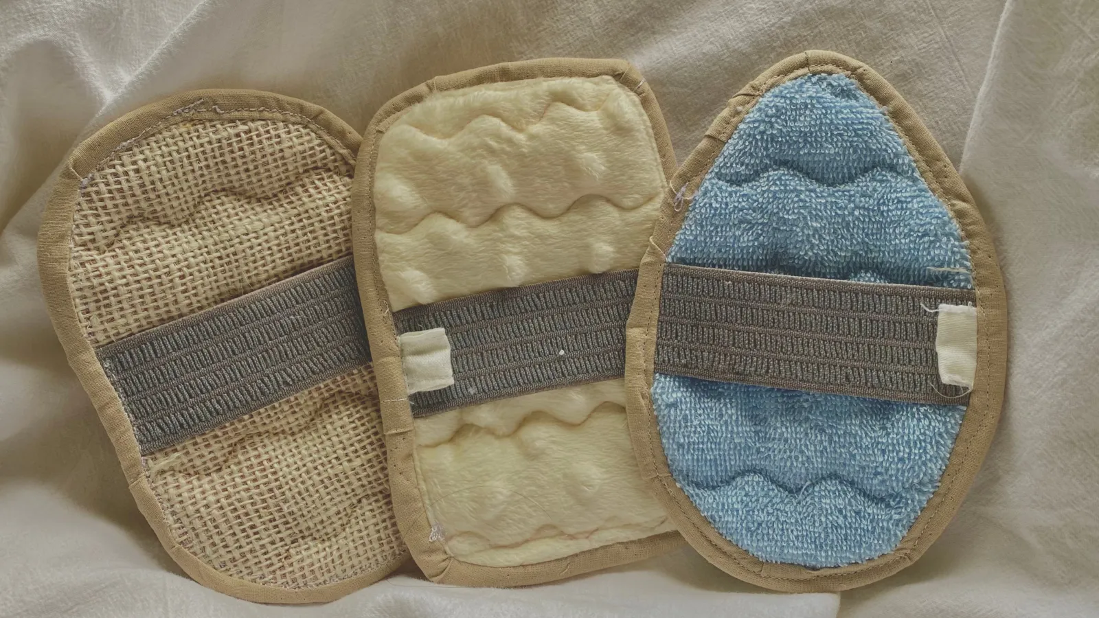 three handcrafted srubbing devices
